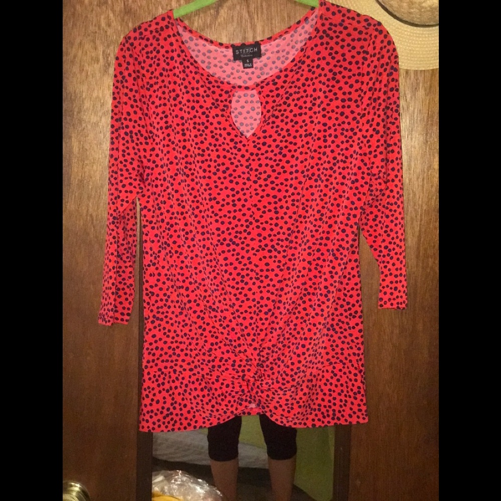 Red and navy polkadot blouse